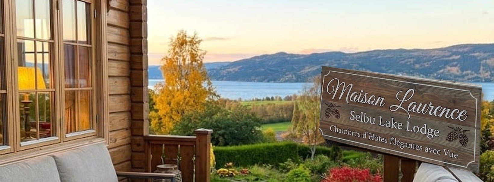 Vista sul lago di Selbu dalla terrazza, con l'insegna Maison Laurence